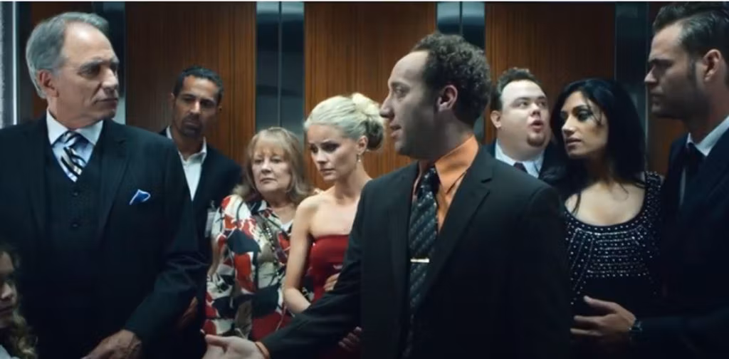 New 'Elevator' Trailer Traps Nine Strangers In A Terrifying Situation
