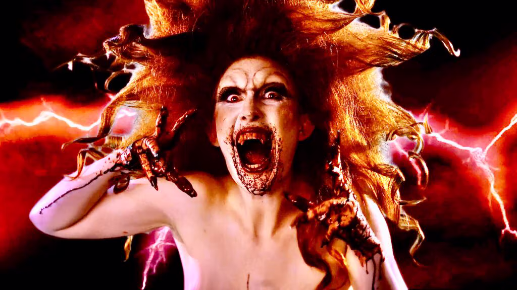 Sink You Fangs Into The Scandalous Trailer For Horror-Comedy 'Bloody Bridget'