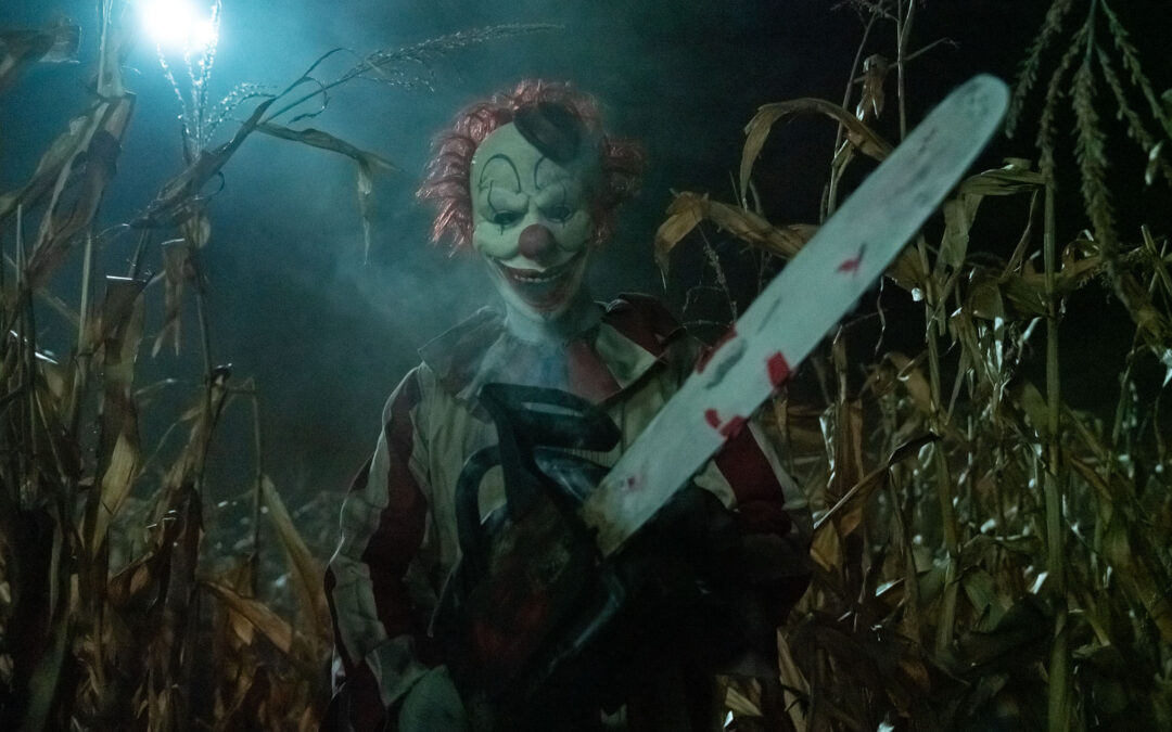 ‘Clown in a Cornfield’ Slashing Its Way into Drive-Ins Ahead of Its Theatrical Debut