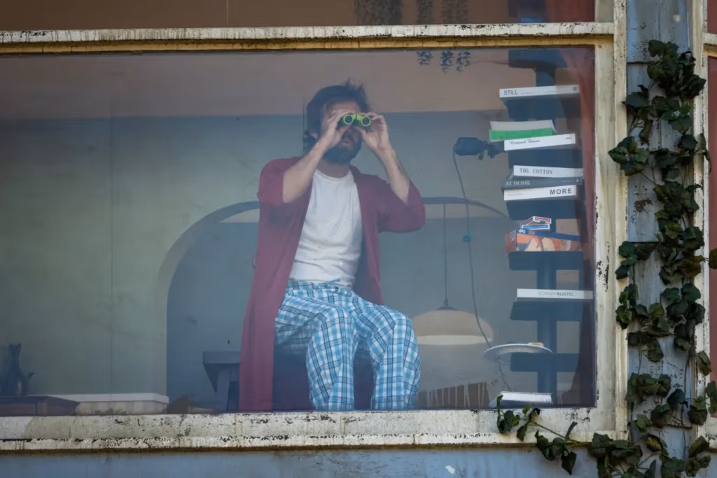 Netflix Takes ‘The Last House’ Marketing to Terrifying New Heights with Man Living Inside the Billboard